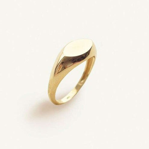 Gold Small Oval Signet Ring on a white background.