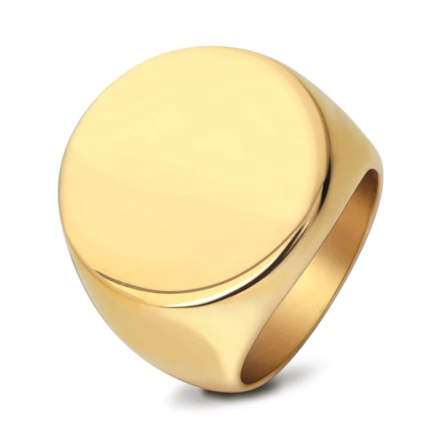 Large round faced gold signet ring shown on a white background.