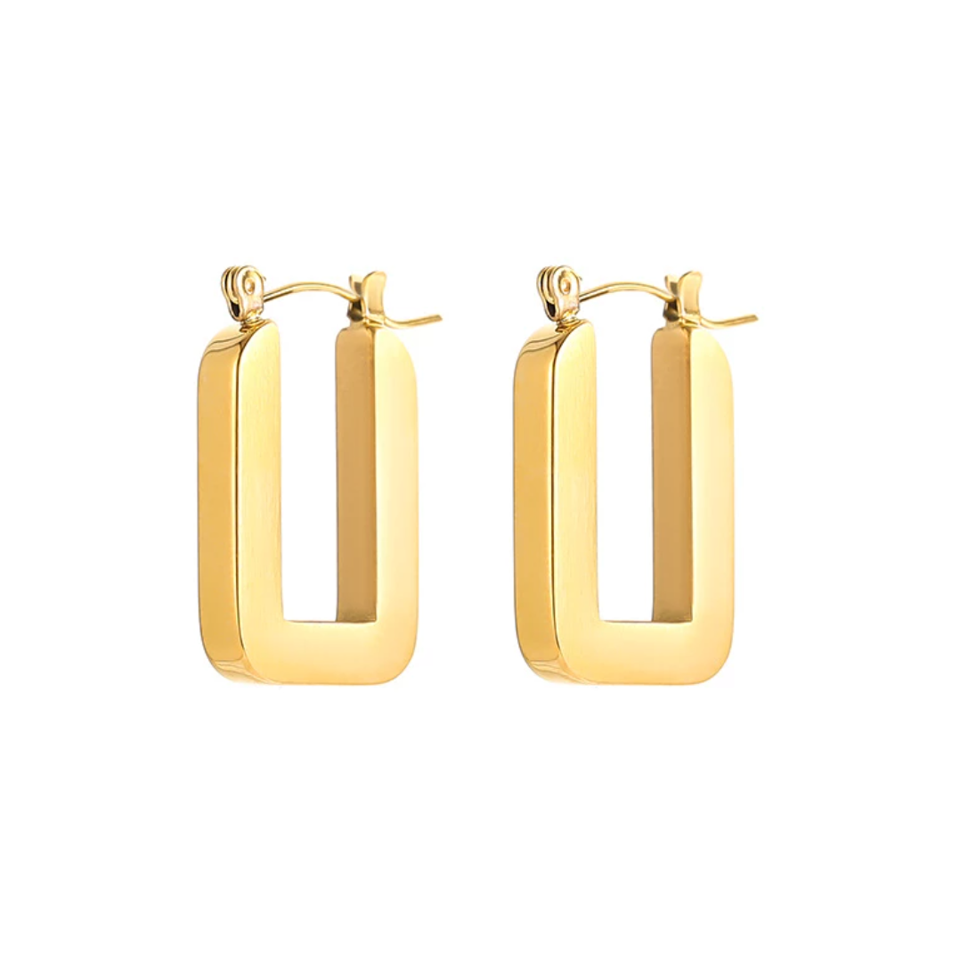 Gold Rectangular You Earrings shining brilliantly on a plain white background.
