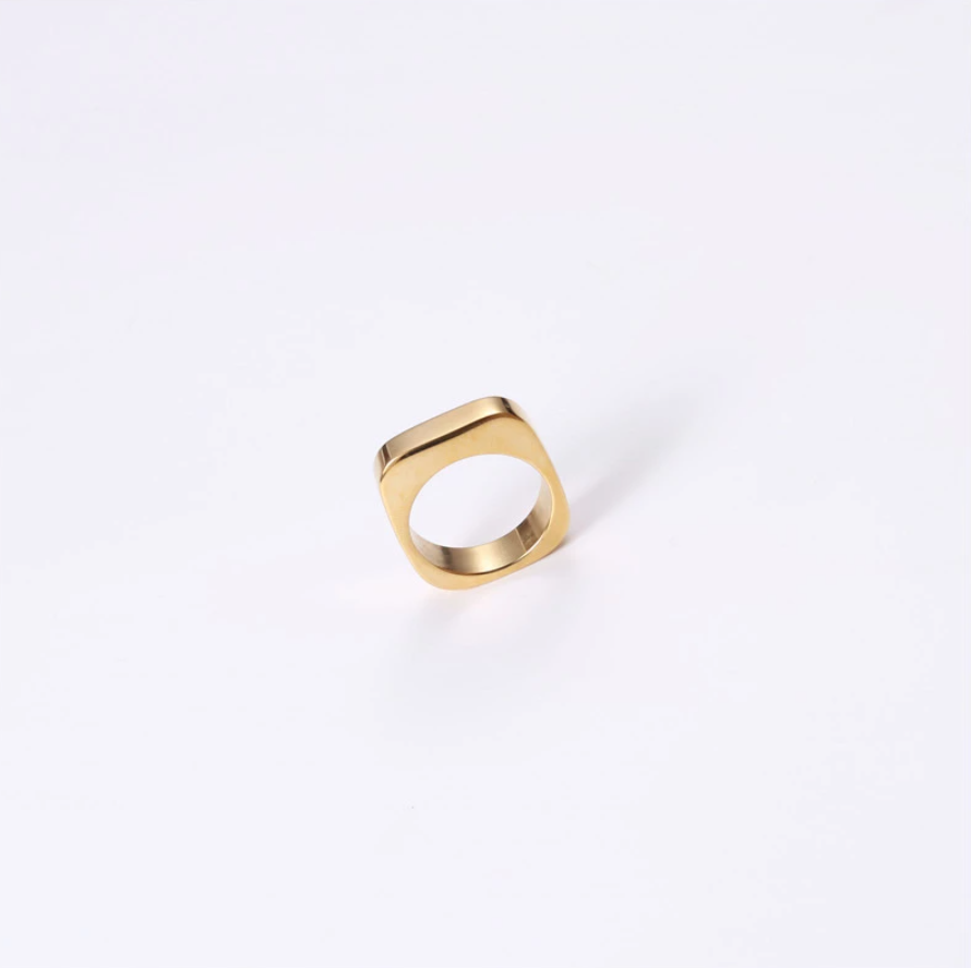 A gold square signet ring as a part of Australian minimalist jewellery collection.