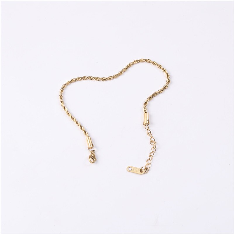 Gold Thin Rope Chain Link Bracelet shining brightly on a white background.