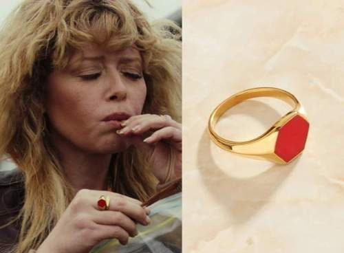 Poker Face actress natasha lyonne wearing a red hexagonal signet ring.